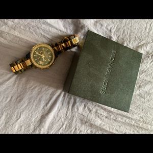 Authentic Michael Kors watch in rose gold tone.